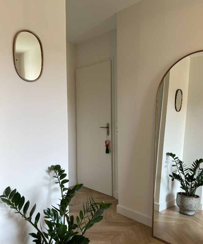 Miroir mural ovale doré
